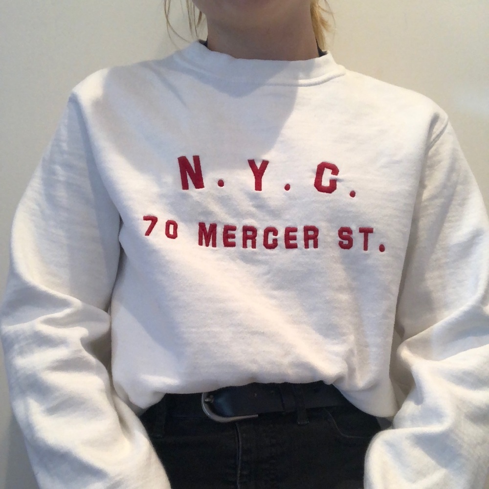 white graphic sweater
